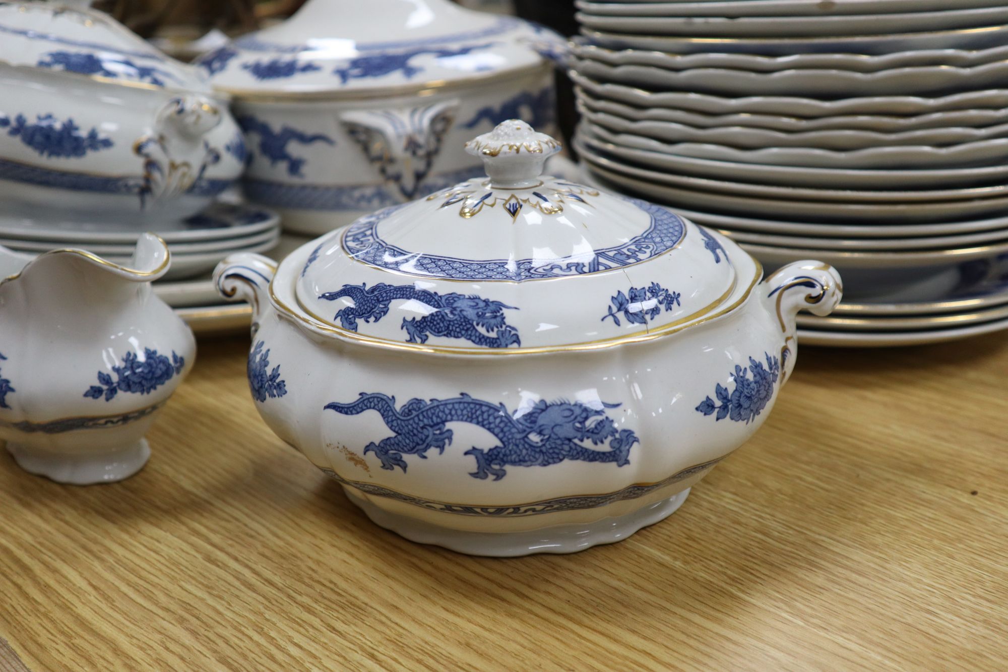 A Booths blue and white dragon pattern part service